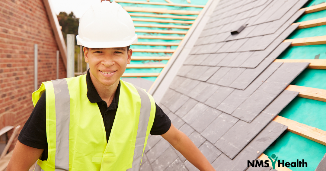 Young worker on a roof