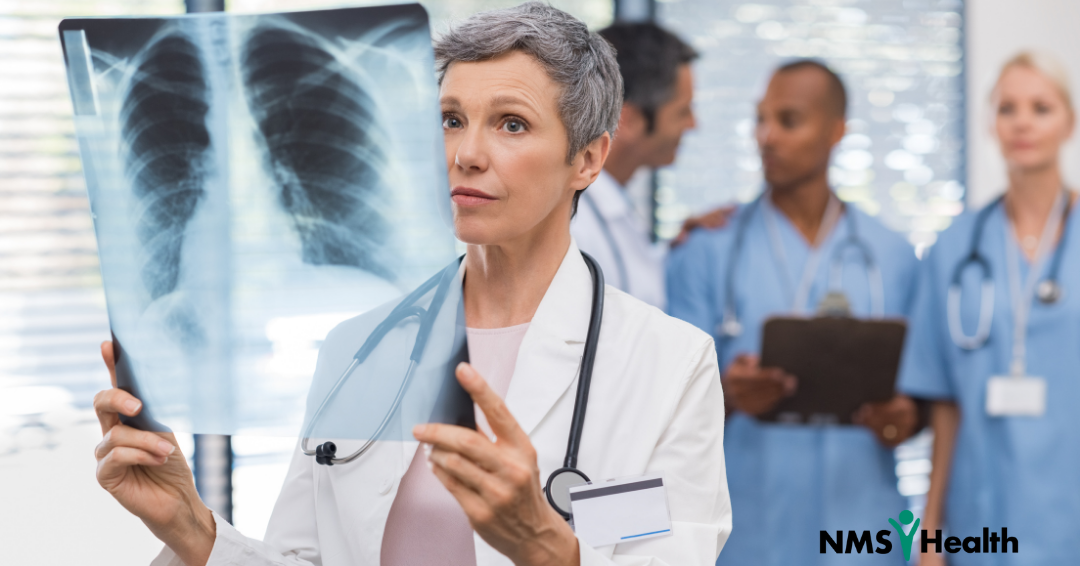 Doctor looking at chest x-ray